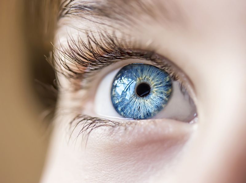 Close up photo of a child's blue eye 