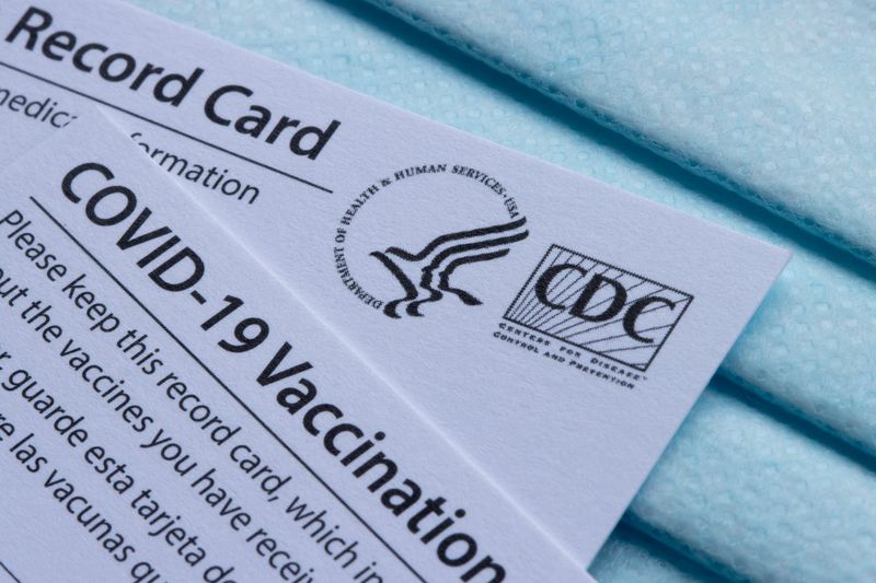 close up of CDC vaccination record cards