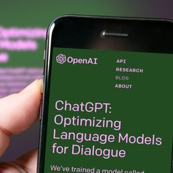 Screen of a smartphone with ChatGPT chat, AI tool, artificial intelligence. Man using ChatGPT the AI chatbot by OpenAI. 