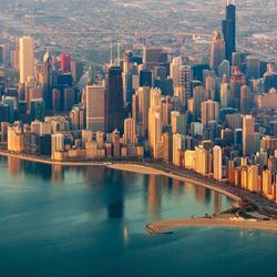 The Chicago city skyline on a Hazy Summer Day on the shore of Lake Michigan.