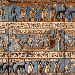 Hieroglyphic carvings and paintings on the interior walls of an ancient egyptian temple in Dendera