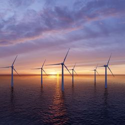 Offshore wind farm at sunset