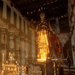 A digital reconstruction of the Parthenon's dark interior with the gold and ivory statue of Athena at the centre. The image has the soft morning sunlight spilling into the entrance, just about illuminating the pillars surround the space as well as a red coloured rug and devotional objects and incense burners in the foreground. The golden dress of the statue is shining as the light touches it.
