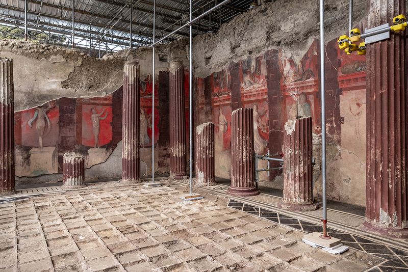 Red painting frescoes at the Roman city of Pompeii