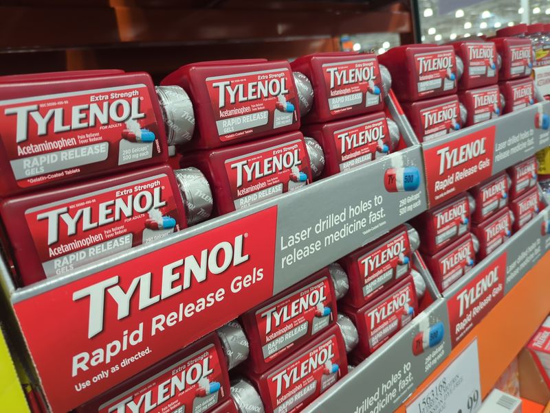 bottles of tylenol rapid release gel capsules on a supermarket shelf