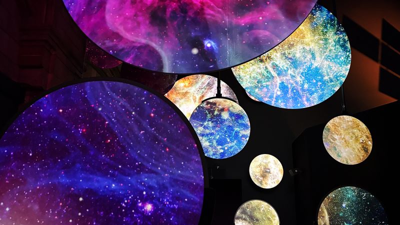 circular screens show differen projects of space envroments 