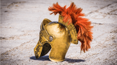 A roman-style helmet on the floor