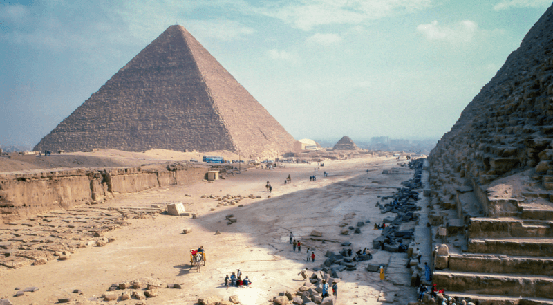 A historical photograph of Egyptian Pyramids, taken from a collection spanning 1950 to 2005.