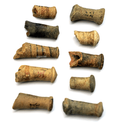 These 4,000 year-old fragments were simply labled "handles" when dug up 90 years ago, but have now been identified as babies' rattles.